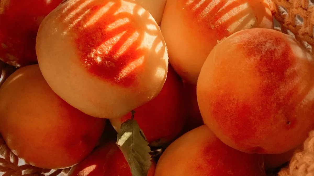 Ripe peaches in a woven basket