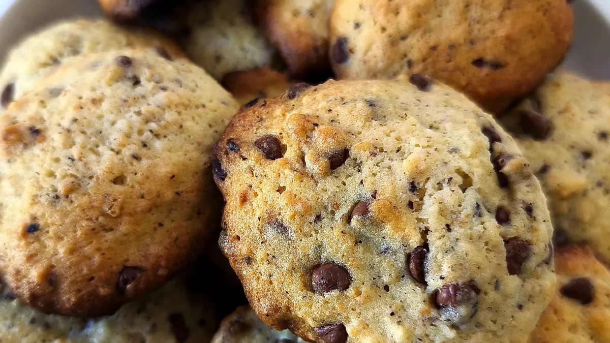 Pile of homemade chocolate chip cookies on a plate